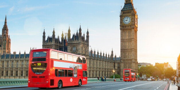 London, United Kingdom - August 20, 2016: Westminster palace and Big Ben and traffic on Westminster bridge in foreground