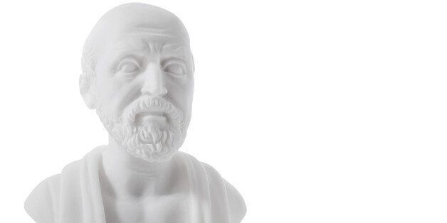 Hippocrates (460-ÂÂ380 B.C.E.) Ancient Greek physician, traditionally regarded as the father of medicine. Sculpture isolated on white background