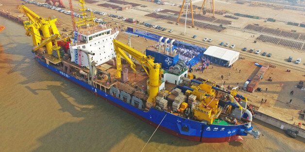 This photo taken on November 3, 2017 shows the ship 'Tian Kun Hao' being launched at a port in Qidong in China's eastern Jiangsu province.China has unveiled a massive ship described as a 'magic island maker' that is Asia's largest dredging vessel, state media reported on November 4. / AFP PHOTO / STR / China OUT (Photo credit should read STR/AFP/Getty Images)