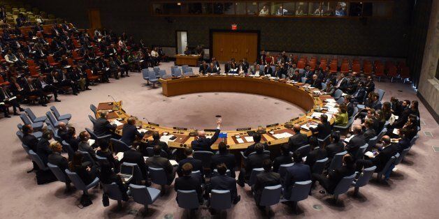 The UN Security Council votes to extend investigations into who is responsible for chemical weapons attacks in Syria at the United Nations on October 24, 2017. Russian Ambassador to the UN Vassily Nebenzia voted no to the resolution. / AFP PHOTO / TIMOTHY A. CLARY (Photo credit should read TIMOTHY A. CLARY/AFP/Getty Images)
