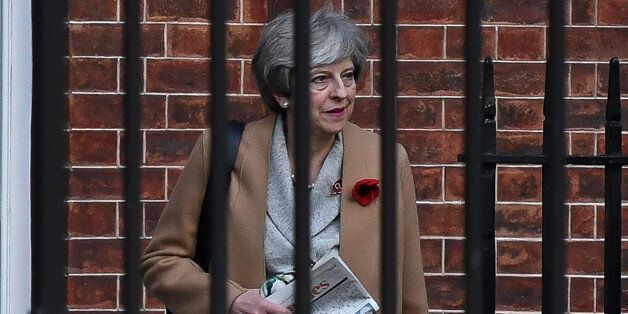 LONDON, ENGLAND - NOVEMBER 09: British Prime Minster Theresa May leaving the back door of No10 Downing St this afternoon after a cabinet reshuffle on November 09, 2017 in London, England. (Photo by Steve Back/Getty Images)