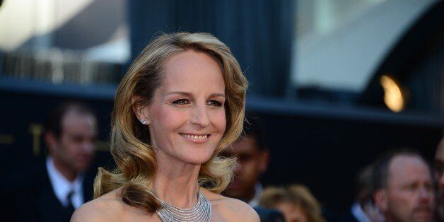 Actress Helen Hunt arrives on the red carpet for the 85th Annual Academy Awards on February 24, 2013 in Hollywood, California. AFP PHOTO/FREDERIC J. BROWN (Photo credit should read FREDERIC J. BROWN/AFP/Getty Images)