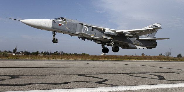 FILES - A Sukhoi Su-24 fighter jet takes off from the Hmeymim air base near Latakia, Syria, in this handout photograph released by Russia's Defence Ministry on October 22, 2015. REUTERS/Ministry of Defence of the Russian Federation/Handout via Reuters ATTENTION EDITORS - THIS PICTURE WAS PROVIDED BY A THIRD PARTY. REUTERS IS UNABLE TO INDEPENDENTLY VERIFY THE AUTHENTICITY, CONTENT, LOCATION OR DATE OF THIS IMAGE. EDITORIAL USE ONLY. NOT FOR SALE FOR MARKETING OR ADVERTISING CAMPAIGNS
