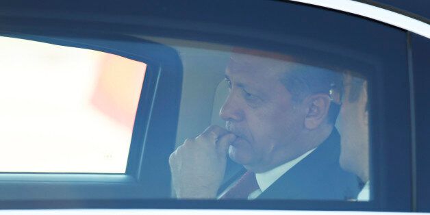 Turkey's President Recep Tayyip Erdogan sits in a car after his arrival at the airport in Hamburg, northern Germany on July 6, 2017 to attend the G20 meeting.Leaders of the world's top economies will gather from July 7 to 8, 2017 in Germany for likely the stormiest G20 summit in years, with disagreements ranging from wars to climate change and global trade. / AFP PHOTO / PATRIK STOLLARZ (Photo credit should read PATRIK STOLLARZ/AFP/Getty Images)