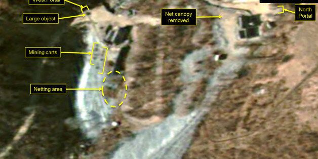 PUNGGYE-RI NUCLEAR TEST SITE, NORTH KOREA - NOVEMBER 1, 2017. Figure 5. While no new spoil has been added near the West Portal, the presence and movement mining carts and equipment have significantly increased. (Photo DigitalGlobe/38 North via Getty Images)