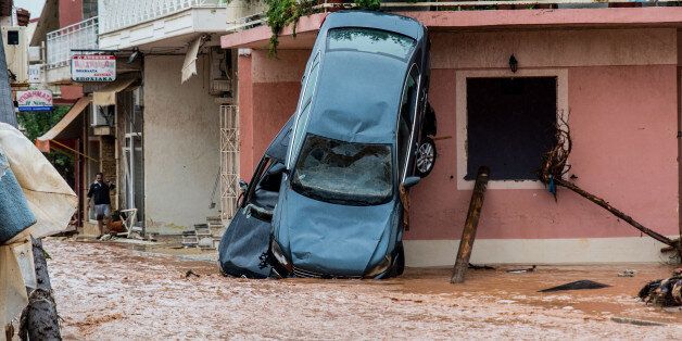 Floods in the town of Mandra, northwest of Athens, Attica, Greece on November 15, 2017, after heavy overnight rainfall in the area caused damage and left 15 people dead (Photo by Dimitris Lampropoulos/NurPhoto via Getty Images)