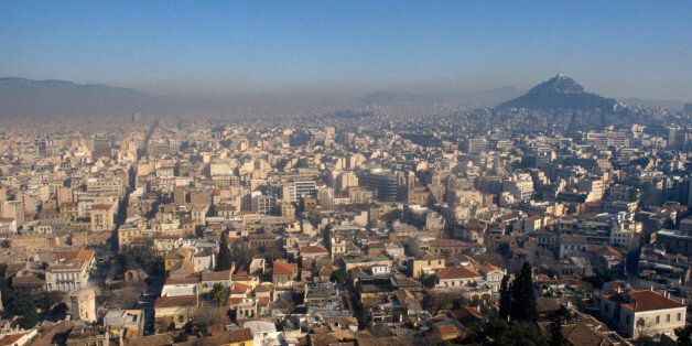 Greece, Central, Athens, Cityscape and smog. (Photo by: Eye Ubiquitous/UIG via Getty Images)
