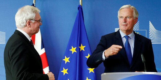 Britain's Secretary of State for Exiting the European Union David Davis (L) and European Union's chief Brexit negotiator Michel Barnier talk to the media, ahead of Brexit talks in Brussels, Belgium September 25, 2017. REUTERS/Francois Lenoir
