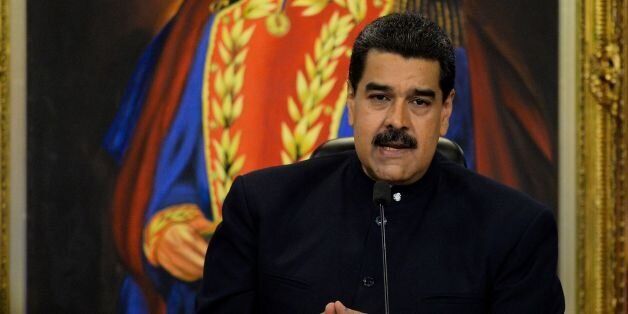 Venezuelan President Nicolas Maduro speaks during a press conference with international media correspondents at Miraflores Presidential Palace in Caracas on October 17, 2017.Maduro said his socialist party's landslide victory in disputed regional elections had delivered a 'strong message' to the United States and its allies. The opposition rejected the results and the US and EU said they were deeply flawed. / AFP PHOTO / Federico PARRA (Photo credit should read FEDERICO PARRA/AFP/Getty Images)
