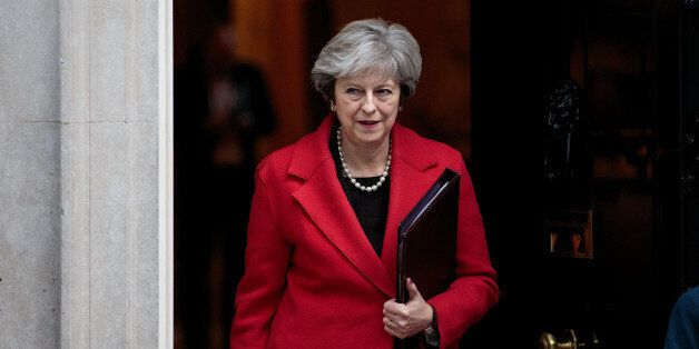 LONDON, ENGLAND - NOVEMBER 13: British Prime Minister Theresa May leaves Number 10 Downing Street on November 13, 2017 in London, England. Mrs May is to hold a meeting with European business leaders today over their concerns about the future of UK-EU trade arrangements after Brexit. (Photo by Jack Taylor/Getty Images)