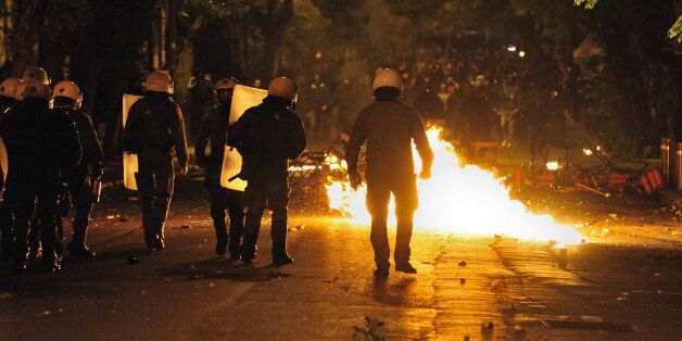 ATHENS, GREECE - NOVEMBER 15: Riot police confront protesters in the Exarcheia region of Athens after the protest march against President Obama's visit on November 15, 2016 in Athens, Greece. (Photo by Nicolas Koutsokostas/Corbis via Getty Images)