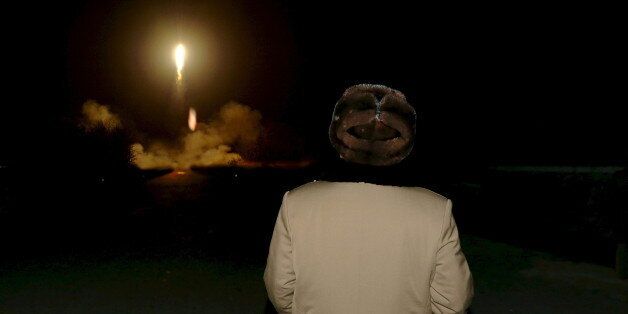 North Korean leader Kim Jong Un watches the ballistic rocket launch drill of the Strategic Force of the Korean People's Army (KPA) at an unknown location, in this undated file photo released by North Korea's Korean Central News Agency (KCNA) in Pyongyang on March 11, 2016. REUTERS/KCNA/Files ATTENTION EDITORS - THIS PICTURE WAS PROVIDED BY A THIRD PARTY. REUTERS IS UNABLE TO INDEPENDENTLY VERIFY THE AUTHENTICITY, CONTENT, LOCATION OR DATE OF THIS IMAGE. FOR EDITORIAL USE ONLY. NOT FOR SALE FOR MARKETING OR ADVERTISING CAMPAIGNS. NO THIRD PARTY SALES. NOT FOR USE BY REUTERS THIRD PARTY DISTRIBUTORS. SOUTH KOREA OUT. NO COMMERCIAL OR EDITORIAL SALES IN SOUTH KOREA. THIS PICTURE IS DISTRIBUTED EXACTLY AS RECEIVED BY REUTERS, AS A SERVICE TO CLIENTS. TPX IMAGES OF THE DAY TPX IMAGES OF THE DAY