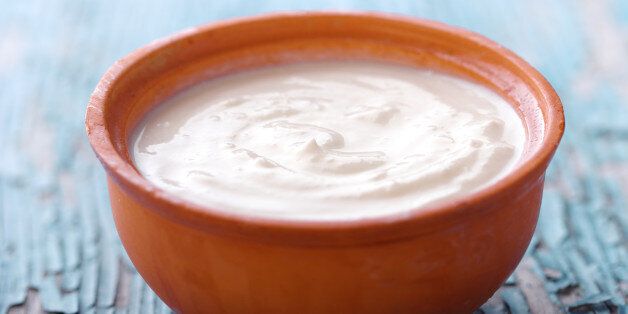 greek yogurt in clay-pot as traditional