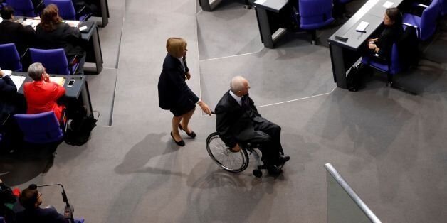 German outgoing Finance Minister Wolfgang Schaeuble arrives to take his place after he was elected president of the parlialement during the first session of the newly-elected parliament on October 24, 2017 at the Bundestag (or lower house of parliament) in Berlin. / AFP PHOTO / Odd ANDERSEN (Photo credit should read ODD ANDERSEN/AFP/Getty Images)