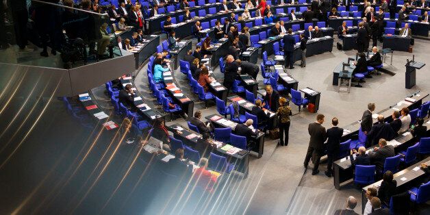 BERLIN, GERMANY - OCTOBER 24: Members of the parliament attend the opening session of the new Bundestag on October 24, 2017 in Berlin, Germany. Today's is the first session since German federal elections in September. The new Bundestag is markedly different from the previous one, as instead of four parties the new parliament contains six, including approximately 90 parliamentarians of the right-wing Alternative for Germany (AfD). Meanwhile the German Christian Democrats (CDU/CSU), the Free Democratic Party (FDP) and the German Greens Party (Buendnis 90/Die Gruenen) are continuing their negotiations for forming a government coalition. (Photo by Carsten Koall/Getty Images)