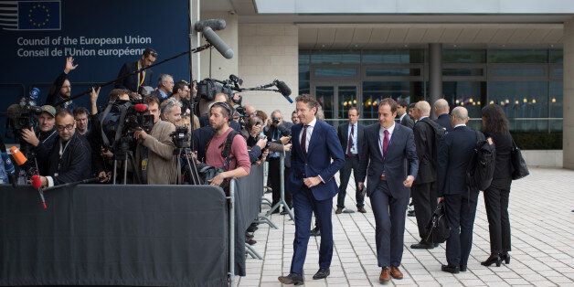 Jeroen Dijsselbloem, Dutch finance minister and head of the group of euro-area finance ministers, center, departs after speaking to journalists ahead of a Eurogroup meeting of European finance ministers in Luxembourg, on Monday, Oct. 9, 2017. When euro-area finance ministers gather in Luxembourg on Monday, theyll begin saying farewell to two of the main protagonists from the blocs biggest existential drama, Germanys Wolfgang Schaeuble and Jeroen Dijsselbloem of the Netherlands. Photographer: Jasper Juinen/Bloomberg via Getty Images