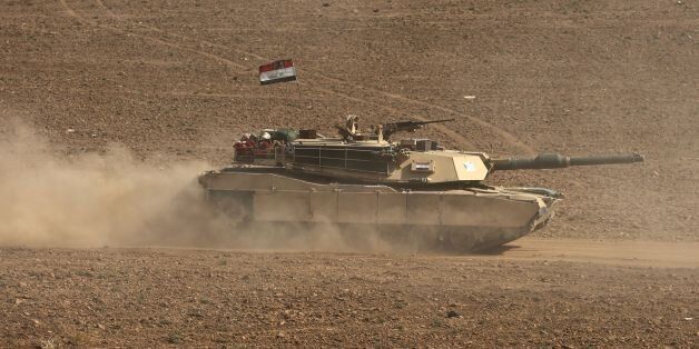 A picture taken on October 26, 2017 shows an Iraqi forces' M1 Abrams main battle tank advancing towards the town of Faysh Khabur, which is located on the Turkish and Syrian borders in the Iraqi Kurdish autonomous region. / AFP PHOTO / AHMAD AL-RUBAYE (Photo credit should read AHMAD AL-RUBAYE/AFP/Getty Images)