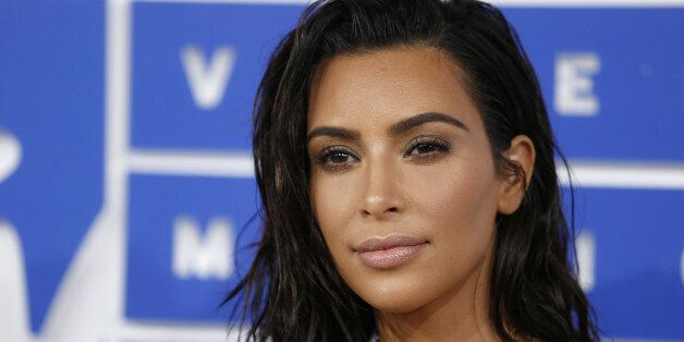 FILE PHOTO: Kim Kardashian arrives at the 2016 MTV Video Music Awards in New York, U.S., August 28, 2016. REUTERS/Eduardo Munoz/File photo