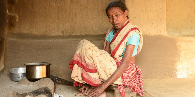 WEST SINGHBHUM, INDIA - DECEMBER 17: Phoolbani, a victim of witch hunting stay in a Jeevari village, on December 17, 2013 in West Singhbhum, India. The National Crime Records Bureau says 2,097 murders were committed between 2000 and 2012 where witch hunting was the motive. (Photo by Ramesh Pathania/Mint via Getty Images)