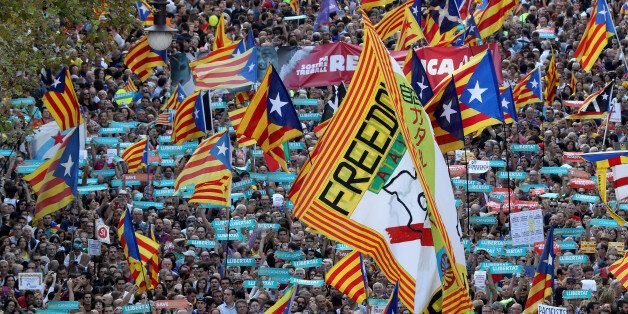 BARCELONA, SPAIN - OCTOBER 21: People hold up Catalan independence flags at a Catalan independence rally to demand the release of imprisoned Catalan leaders Jordi Sanchez and Jordi Cuixart on October 21, 2017 in Barcelona, Spain. The Spanish government announced measures today it will implement in triggering Article 155, which would lead to the imposition of direct rule by Spanish authorities in Catalonia and at least temporarily suspend the region's autonomy. The government also plans to hold Catalan regional elections in January. The moves come after Catalan regional President Carles Puigdemont let a Thursday deadline today pass and threatened to go forward with Catalan independence. (Photo by Sean Gallup/Getty Images)