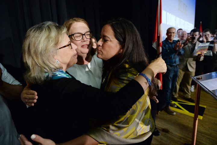 Independent candidates Jody Wilson-Raybould and Jane Philpott and Green Party Leader Elizabeth May hug following an election campaign event in Vancouver on Sept. 18, 2019.