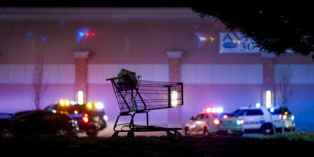 THORNTON, CO - NOVEMBER 1: A lone shopping cart sits in the parking lot as police investigate the scene of a shooting at a Wal Mart store in the Thorton Town Center shopping plaza on November 1, 2017 in Thornton, Colorado. According to reports, two people were killed and one was injured. (Photo by Marc Piscotty/Getty Images)