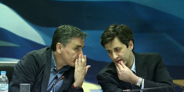 ATHENS, ATTICA, GREECE - 2016/05/26: Finance Minister Euclid Tsakalotos (L) with Deputy Finance Minister George Chouliarakis during a joint press conference to inform about the outcome of the Eurogroup at the Finance ministry in Athens. (Photo by Panayotis Tzamaros/Pacific Press/LightRocket via Getty Images)