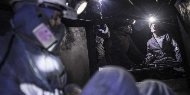 Miners enter a coal mine in Cucunuba, Cundinamarca Department, Colombia, on Friday, July 28, 2017. Colombia is set to produce a record of more than 90 million tons of the fossil fuel this year, its biggest export after oil. Colombia continues to bet on coal, even as global demand tapers off because the world is switching to cleaner fuels. Photographer: Nicolo Filippo Rosso/Bloomberg via Getty Images
