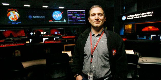 Jet Propulsion Laboratory scientist Barry Goldstein, project manager for NASA's Phoenix Mars Lander, stands in the mission control room at JPL in Pasadena, California May 23, 2008. The spacecraft is scheduled to touchdown on the arctic plains of Mars on May 25, 2008. REUTERS/Mario Anzuoni (UNITED STATES)