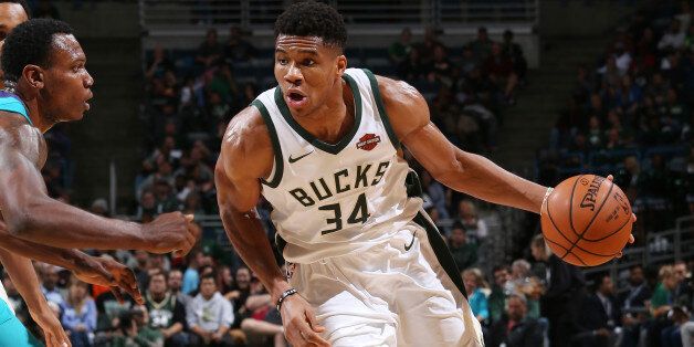 MILWAUKEE, WI - OCTOBER 23: Giannis Antetokounmpo #34 of the Milwaukee Bucks handles the ball against the Charlotte Hornets on October 23, 2017 at the BMO Harris Bradley Center in Milwaukee, Wisconsin. NOTE TO USER: User expressly acknowledges and agrees that, by downloading and or using this Photograph, user is consenting to the terms and conditions of the Getty Images License Agreement. Mandatory Copyright Notice: Copyright 2017 NBAE (Photo by Gary Dineen/NBAE via Getty Images)