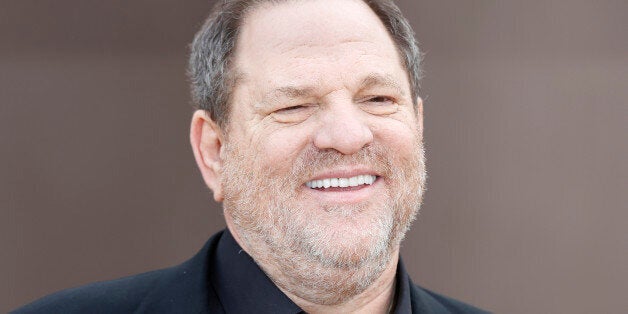 U.S. film producer Harvey Weinstein arrives to attend the presentation of the Burberry Autumn/Winter 2014 collection during London Fashion Week February 17, 2014. REUTERS/Olivia Harris (BRITAIN - Tags: FASHION HEADSHOT ENTERTAINMENT)