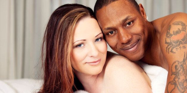 Boudoir portrait of a bi-racial couple. You might also be interested in these: