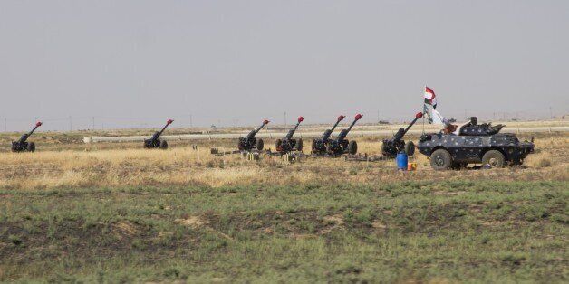 KIRKUK, IRAQ - OCTOBER 14: Iraqi security forces' cannons are deployed to meters away from the Peshmerga site in Kirkuk, Iraq on October 14, 2017. Iraqi security forces continue to deploy troops at southern Kirkuk as tension between Hashd al-Shaabi fighters and Peshmerga increases. (Photo by Hassan Ghaedi/Anadolu Agency/Getty Images)
