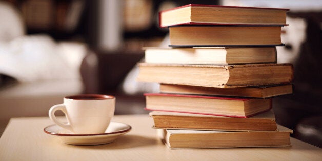 stack of books in home interior