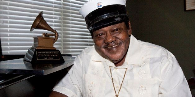 NEW ORLEANS - MAY 01: Fats Domino poses after accepting his Grammy Lifetime Achievement Award presented by the Recording Academy's Angelia Bibbs-Sanders at a ceremony to replace Lifetime Achievement Award lost in Hurricane Katrina at Private Residence on May 1, 2009 in New Orleans, Louisiana. (Photo by Skip Bolen/WireImage for NARAS)
