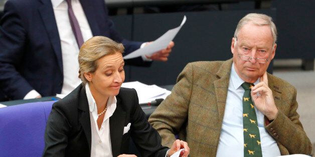 Leaders of the anti-immigration party Alternative for Germany (AfD) Bundestag group Alice Weidel and Alexander Gauland attend the first plenary session of German lower house of Parliament after a general election in Berlin, Germany, October 24, 2017. REUTERS/Fabrizio Bensch