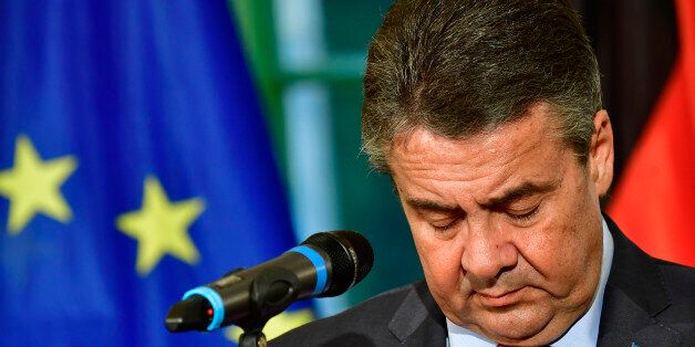 German Foreign Minister Sigmar Gabriel listens to a speech of his Lithuanian counterpart during a signing ceremony on the loan of a historic document on Lithuania's declaration of independence at Villa Borsig in Berlin on October 5, 2017.The document dating from the year 1918 was found in the political archives of Germany's Foreign Ministry in Berlin. / AFP PHOTO / Tobias SCHWARZ (Photo credit should read TOBIAS SCHWARZ/AFP/Getty Images)