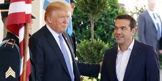 WASHINGTON, DC - OCTOBER 17: U.S. President Donald Trump (L) welcomes Greek Prime Minister Alexis Tsipras to the White House October 17, 2017 in Washington, DC. A left-wing socialist, Tsipras was critical of Trump during his 2016 presidential campaign. But with tension high between the U.S. and Turkey, Trump and Tsipras are looking for renewed ties as they discuss defense, economic issues, energy security and cultural ties, according to the White House. (Photo by Chip Somodevilla/Getty Images)