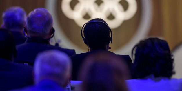 Members of the International Olympic Committee (IOC) attends the 131st IOC Session in Lima on September 13, 2017.The ICO meeting in Lima will confirm Paris and Los Angeles as hosts for the 2024 and 2028 Olympics, crowning two cities at the same time in a historic first for the embattled sports body. / AFP PHOTO / Fabrice COFFRINI (Photo credit should read FABRICE COFFRINI/AFP/Getty Images)