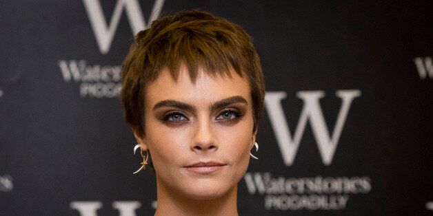 LONDON, ENGLAND - OCTOBER 04: Cara Delevingne attends the signing of her debut Young Adult novel 'Mirror, Mirror' at Waterstones Piccadilly on October 4, 2017 in London, England. (Photo by Tristan Fewings/Getty Images)