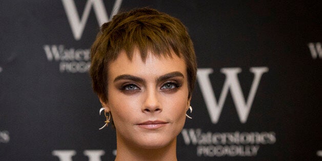 LONDON, ENGLAND - OCTOBER 04: Cara Delevingne attends the signing of her debut Young Adult novel 'Mirror, Mirror' at Waterstones Piccadilly on October 4, 2017 in London, England. (Photo by Tristan Fewings/Getty Images)