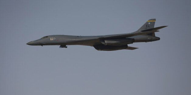 A Rockwell B-1 Lancer bomber performs a flypast on the opening day of the 14th Dubai Air Show at Dubai World Central (DWC) in Dubai, United Arab Emirates, on Sunday, Nov. 8, 2015. The Dubai Air Show is the biggest aerospace event in the Middle East, Asia and Africa and runs Nov. 8 - 12. Photographer: Jasper Juinen/Bloomberg via Getty Images