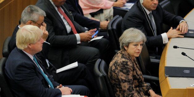 British Prime Minister Theresa May sits in front of British Foreign Secretary Boris Johnson during a meeting to discuss the current situation in Libya during the 72nd United Nations General Assembly at U.N. headquarters in New York, U.S., September 20, 2017. REUTERS/Lucas Jackson