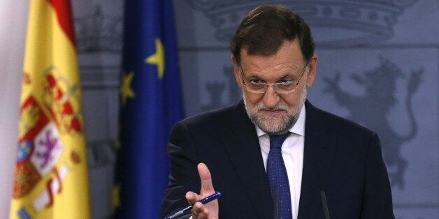 Spain's Prime Minister Mariano Rajoy gestures during a news conference at Moncloa Palace in Madrid, Spain, September 28, 2015. Rajoy said on Monday he was ready to collaborate with the next Catalan government and hold talks on a wide range of issues but always