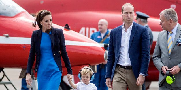 FAIRFORD, WALES - JULY 08: Catherine, Duchess of Cambridge, Prince Willliam, Duke of Cambridge and Prince George during a visit to the Royal International Air Tattoo at RAF Fairford on July 8, 2016 in Fairford, England. (Photo by Richard Pohle - WPA Pool/Getty Images)