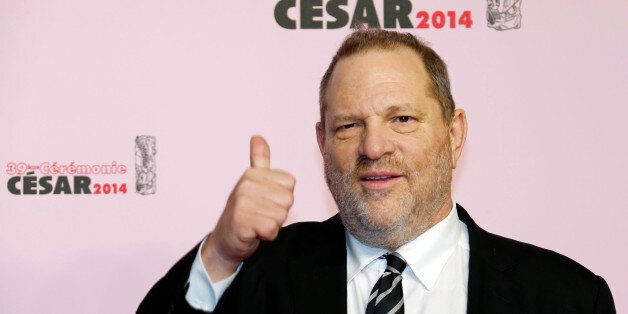Producer Harvey Weinstein gestures as he arrives at the 39th Cesar Awards ceremony in Paris February 28, 2014. REUTERS/Regis Duvignau (FRANCE - Tags: ENTERTAINMENT)
