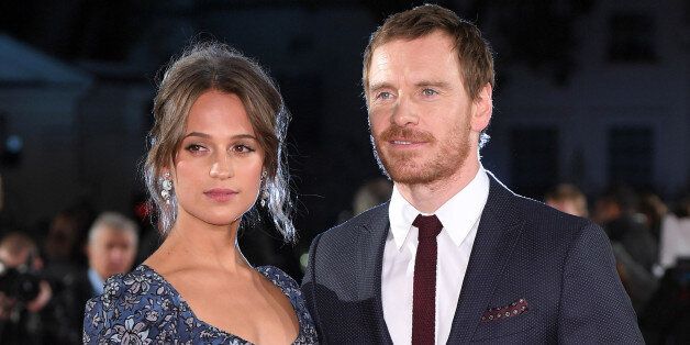 LONDON, ENGLAND - OCTOBER 19: Alicia Vikander and Michael Fassbender arrive for the UK premiere of 'The Light Between Oceans' at The Curzon Mayfair on October 19, 2016 in London, England. (Photo by Karwai Tang/WireImage)