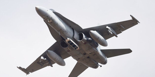 TOWNSVILLE, AUSTRALIA - OCTOBER 05: A RAAF (Royal Australian Air Force) F/A-18 Hornet conducts a 'show of force' as part of Exercise Black Dagger on October 5, 2017 in Townsville, Australia. Black Dagger is a field training exercise held at RAAF Base Townsville from 2 to 13 October and is the culmination of Number 60 Joint Terminal Attack Controller (JTAC) course aimed at producing personnel to be combat ready. (Photo by Ian Hitchcock/Getty Images)