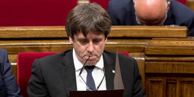 Carles Puigdemont, president of the Catalan government, declares the republic and independence of Catalonia, leaving it without effect to start a negotiation process in the Parlament de Catalunya in Barcelona on October 10, 2017. (Photo by Miquel Llop/NurPhoto via Getty Images)