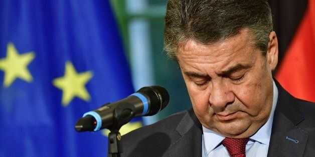 German Foreign Minister Sigmar Gabriel listens to a speech of his Lithuanian counterpart during a signing ceremony on the loan of a historic document on Lithuania's declaration of independence at Villa Borsig in Berlin on October 5, 2017.The document dating from the year 1918 was found in the political archives of Germany's Foreign Ministry in Berlin. / AFP PHOTO / Tobias SCHWARZ (Photo credit should read TOBIAS SCHWARZ/AFP/Getty Images)